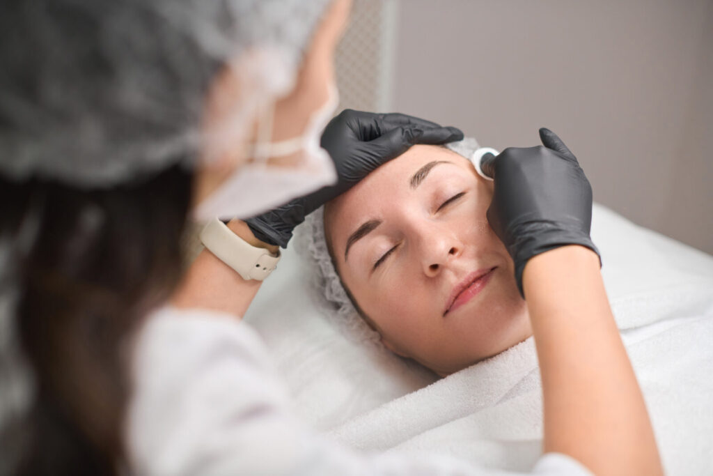 Professional facial treatment in modern beauty clinic